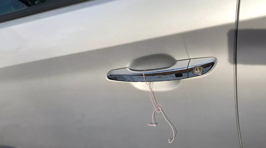 Seeing a Wire Tied Around a Car Door Handle: What It Could Mean