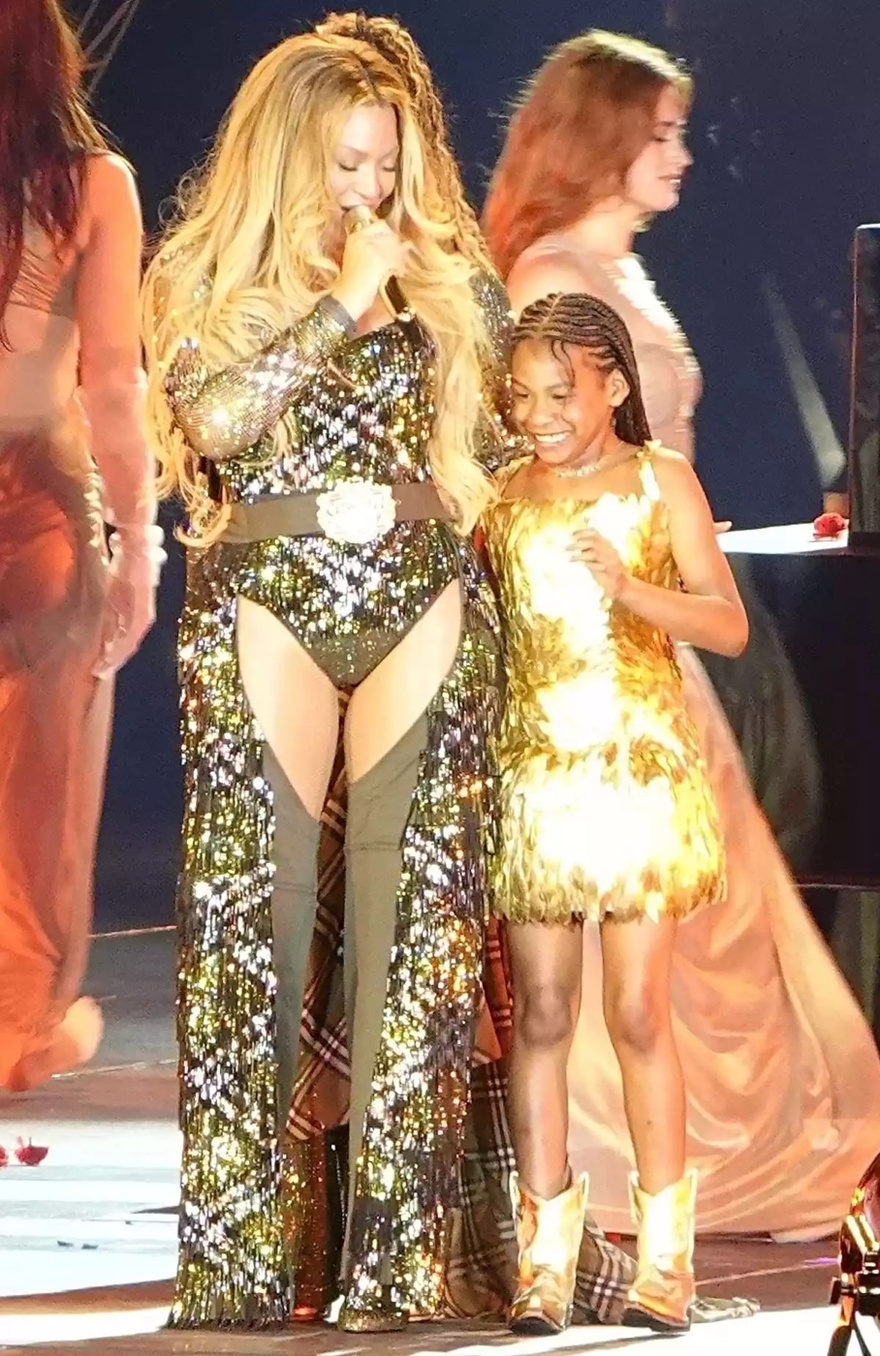 Beyoncé’s Daughter Rumi, 7, Makes Rare Appearance During Live Show with Mom as Big Sister Blue Ivy, 13, Towers over Both