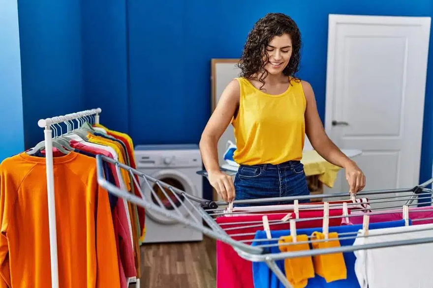 Why is it not recommended to hang out the clothes outside?