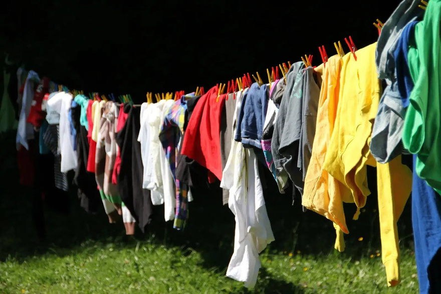 Why is it not recommended to hang out the clothes outside?