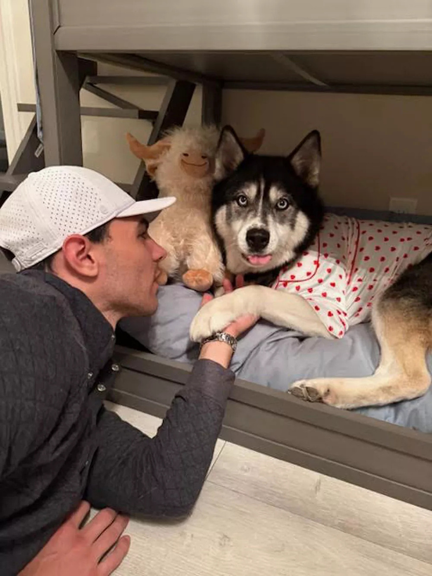 Couple Shares Viral Nighttime Routine for Their Dogs — and Receives Backlash for Putting Them in Pajamas