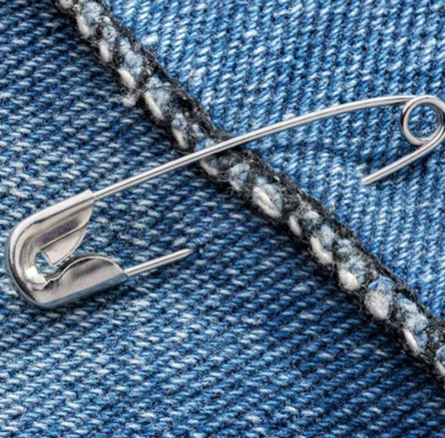 What’s the Purpose of That Tiny Hole in a Safety Pin?